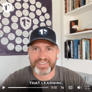 Coach Brandon Jenkins speaks about growth mindset. Image shows Brandon in his office, with his Blueprint behind him.